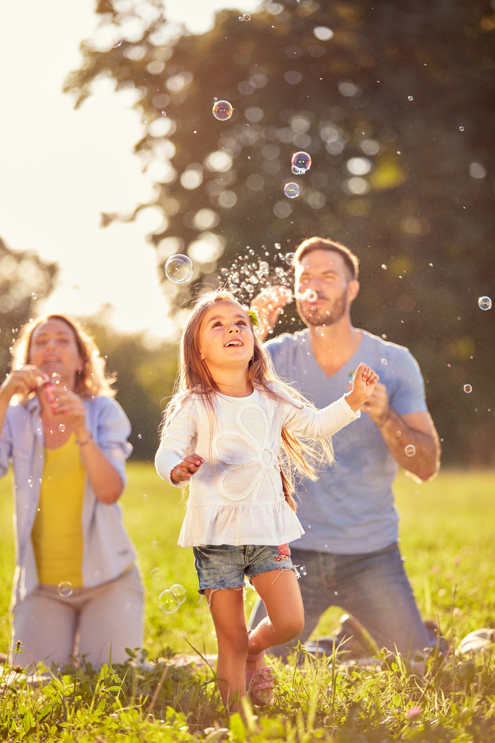 Family playing outdoors - Chiropractor in Cordova, AK